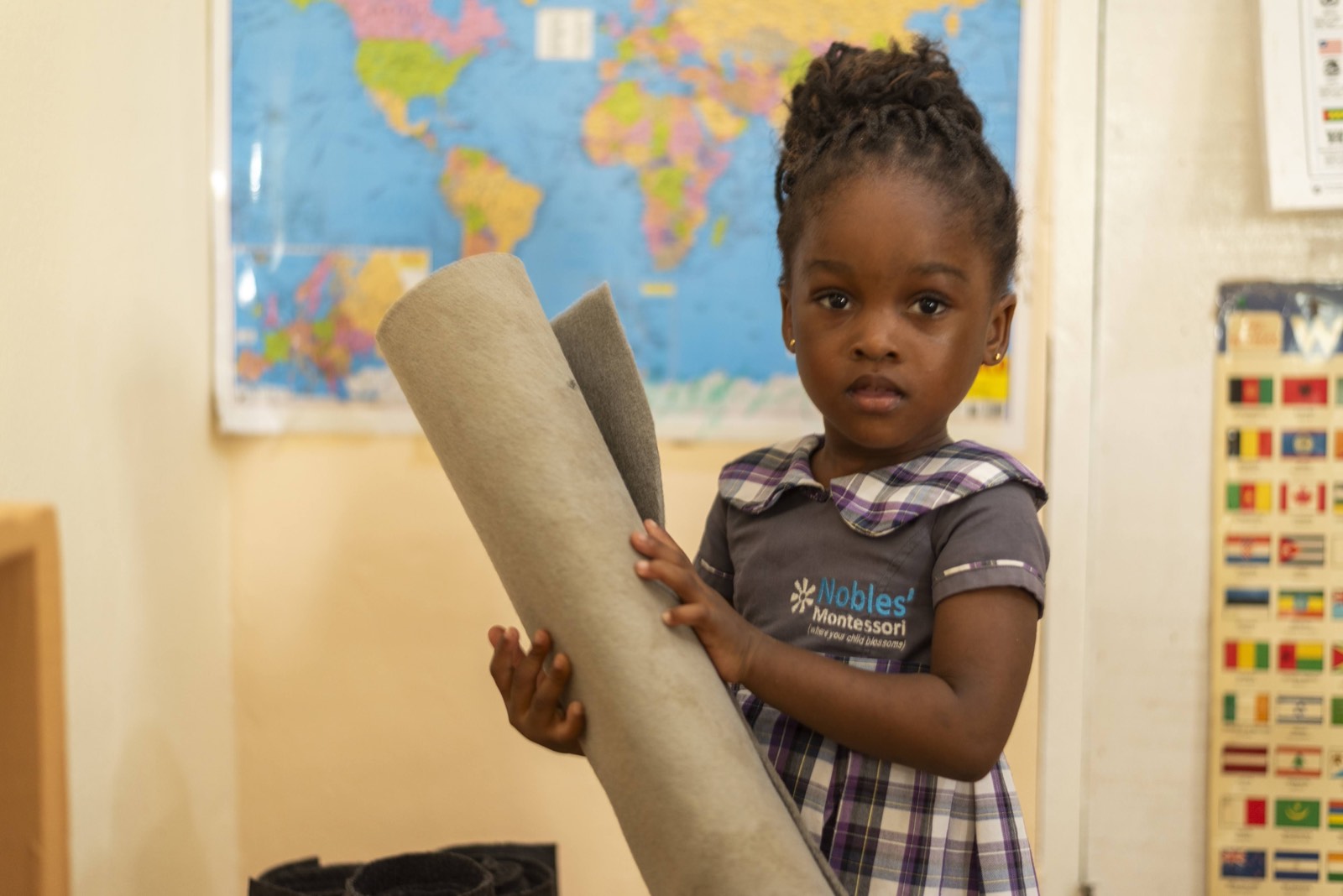 Child exploring cultural materials